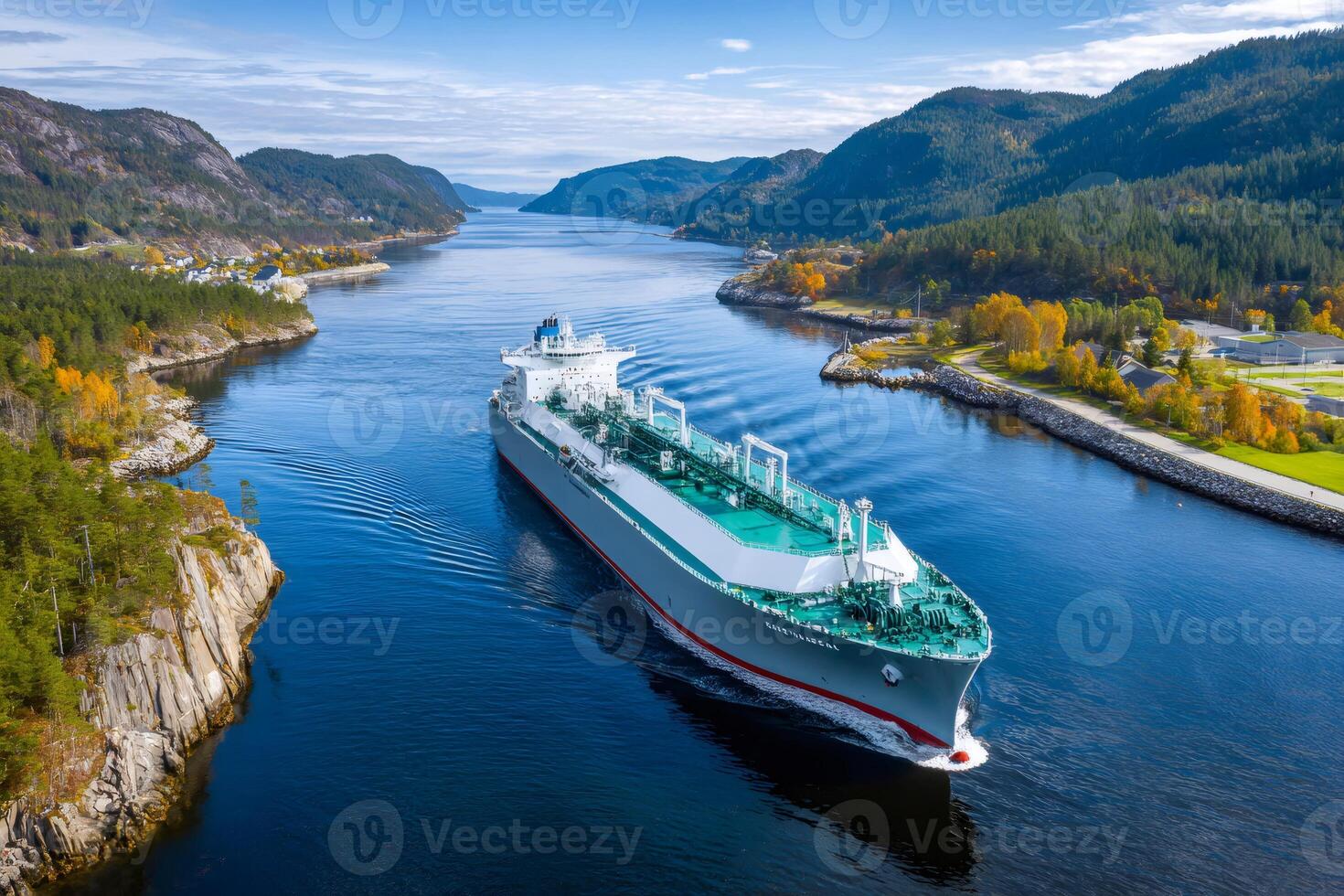 Large gas carrier navigating a fjord in norway on a clear autumn day photo