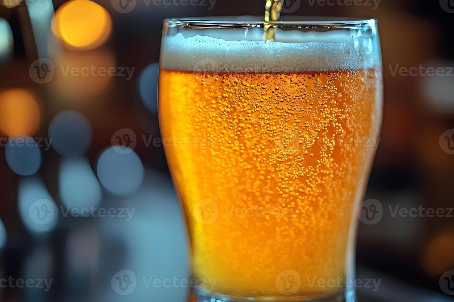 Refreshing Cold Beer with Bubbles in a Glass for Summer Relaxation photo