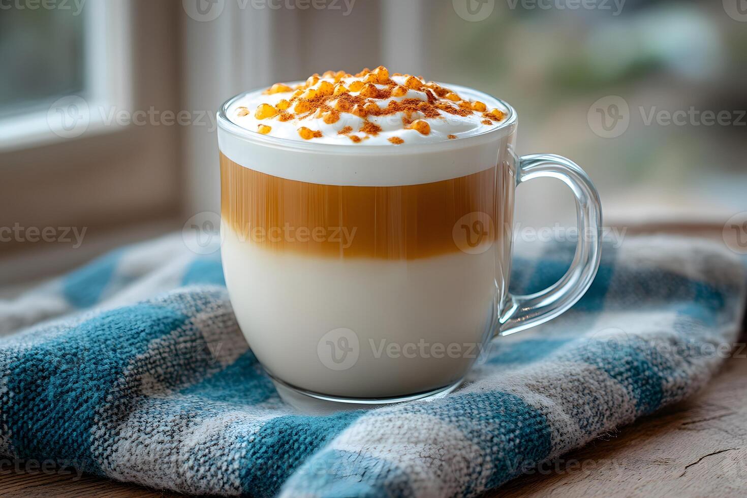Cozy Autumn Beverage - Layered Caramel Latte with Whipped Cream for Warmth and Relaxation photo