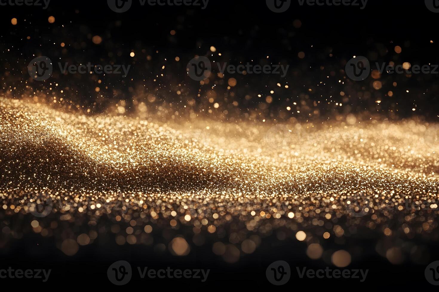Golden Glittering Particles on Black Background for Elegant Design or Festive Projects photo