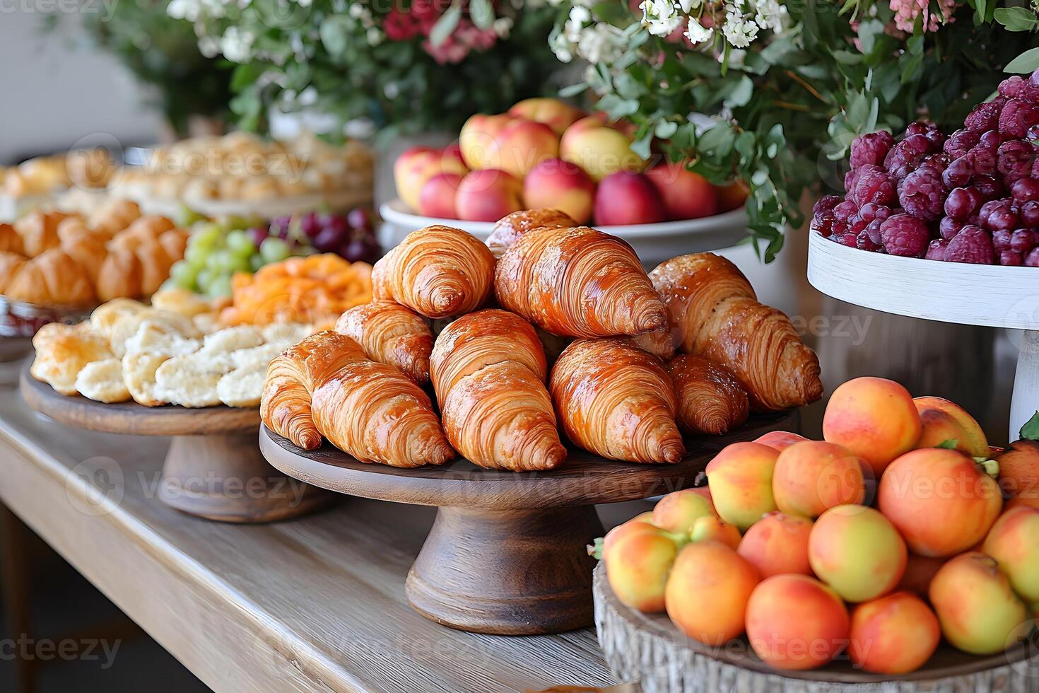 Assortment of Fresh Pastries and Fruits on Elegant Display for Event Catering photo