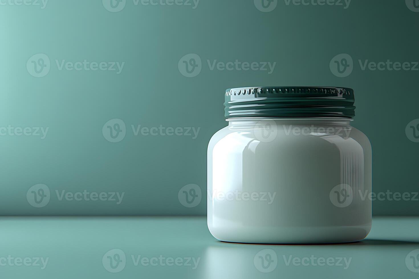 Minimalist Glass Jar with Lid on Turquoise Background for Design and Branding photo