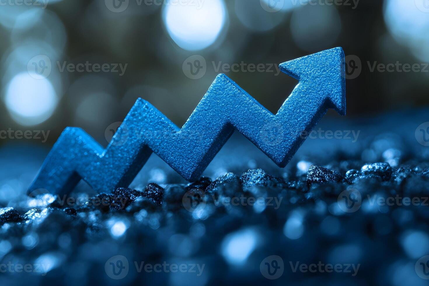 Financial Growth Concept Rising Arrow on Blue Pebbles for Business Success photo