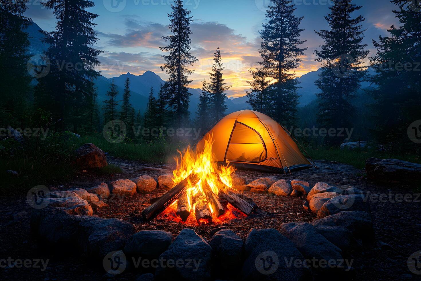Cozy Camping Experience Campfire and Tent in Mountainous Forest Setting at Sunset photo