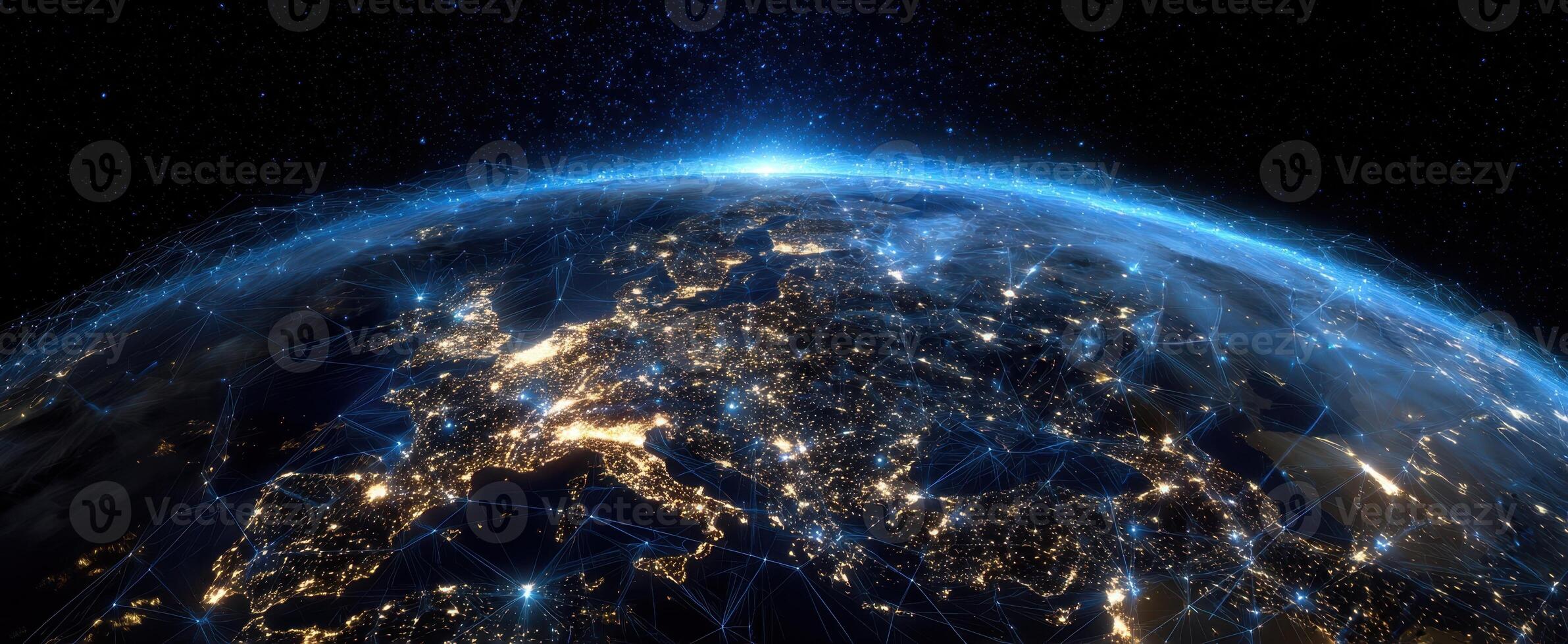 The illuminated globe showcasing interconnected cities and networks at night. photo
