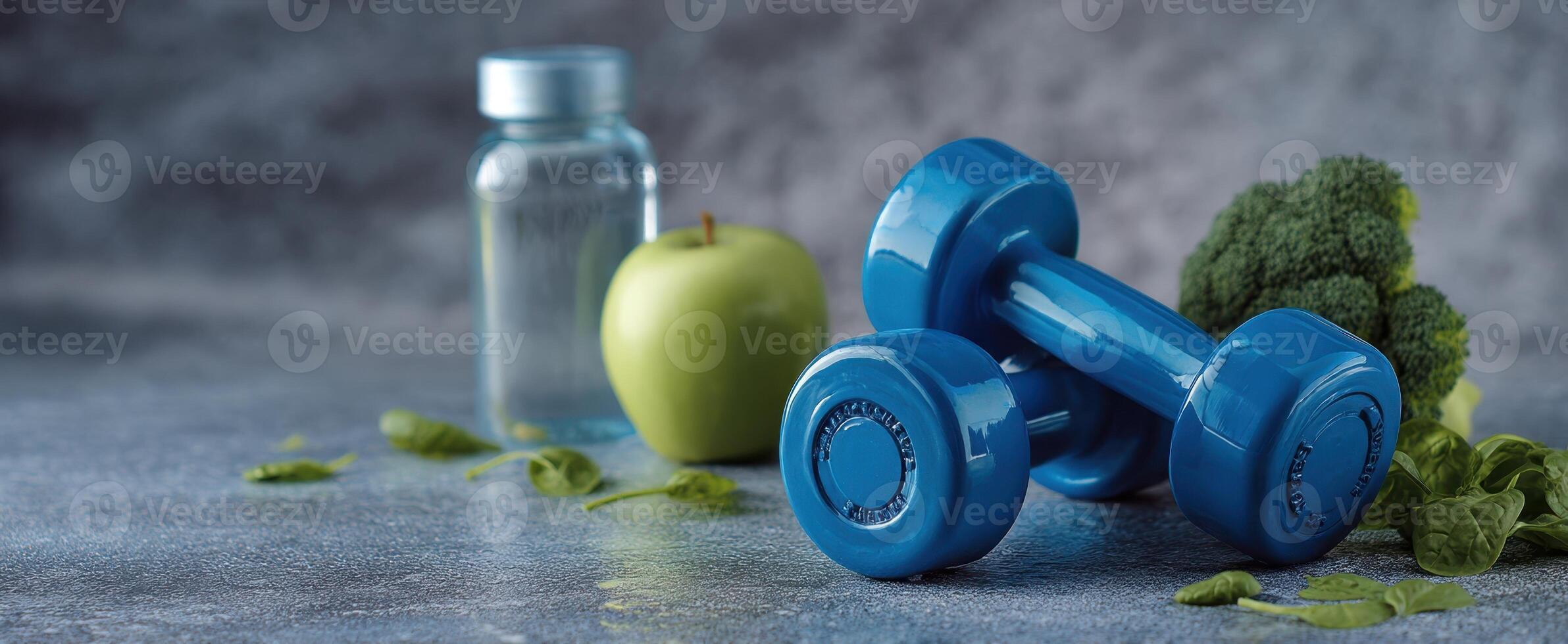 The vibrant blue dumbbells and fresh produce on a stylish countertop. photo
