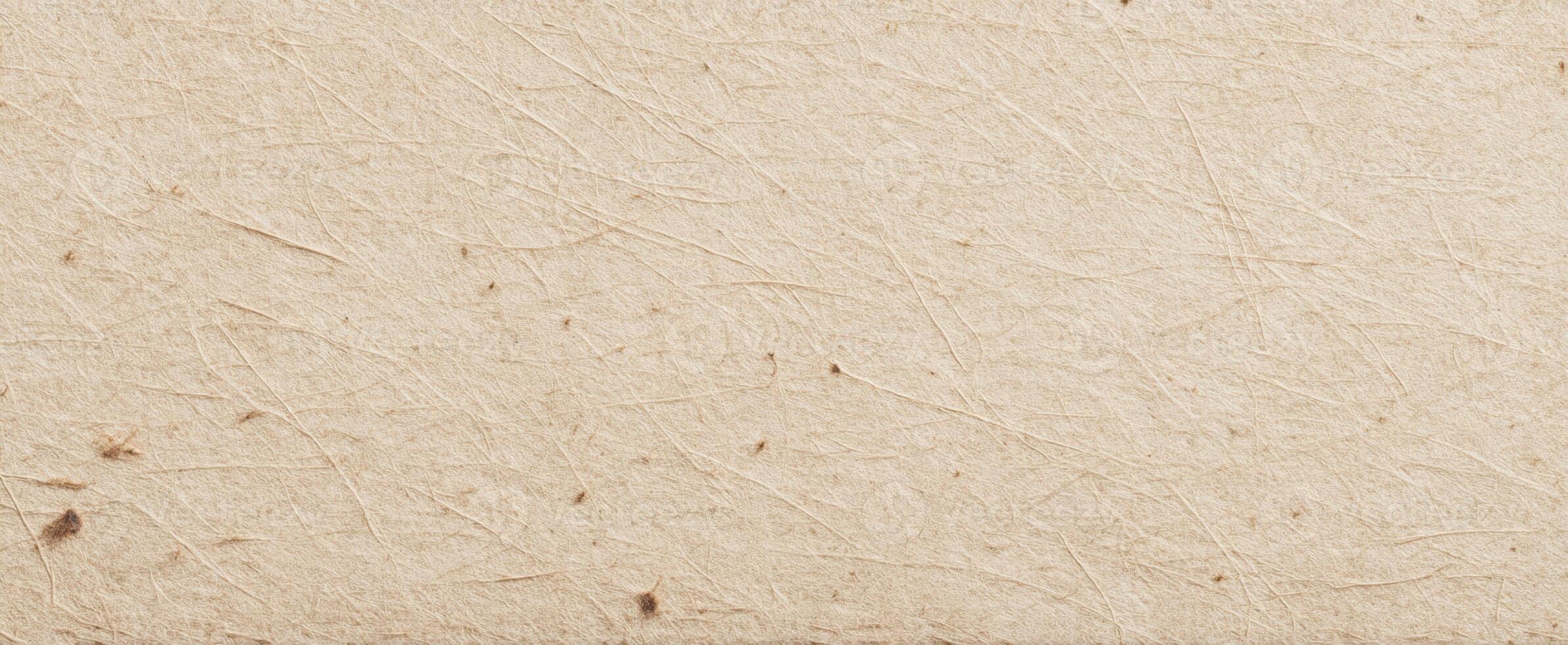 The textured surface of natural paper creating an inviting background for creative projects. photo