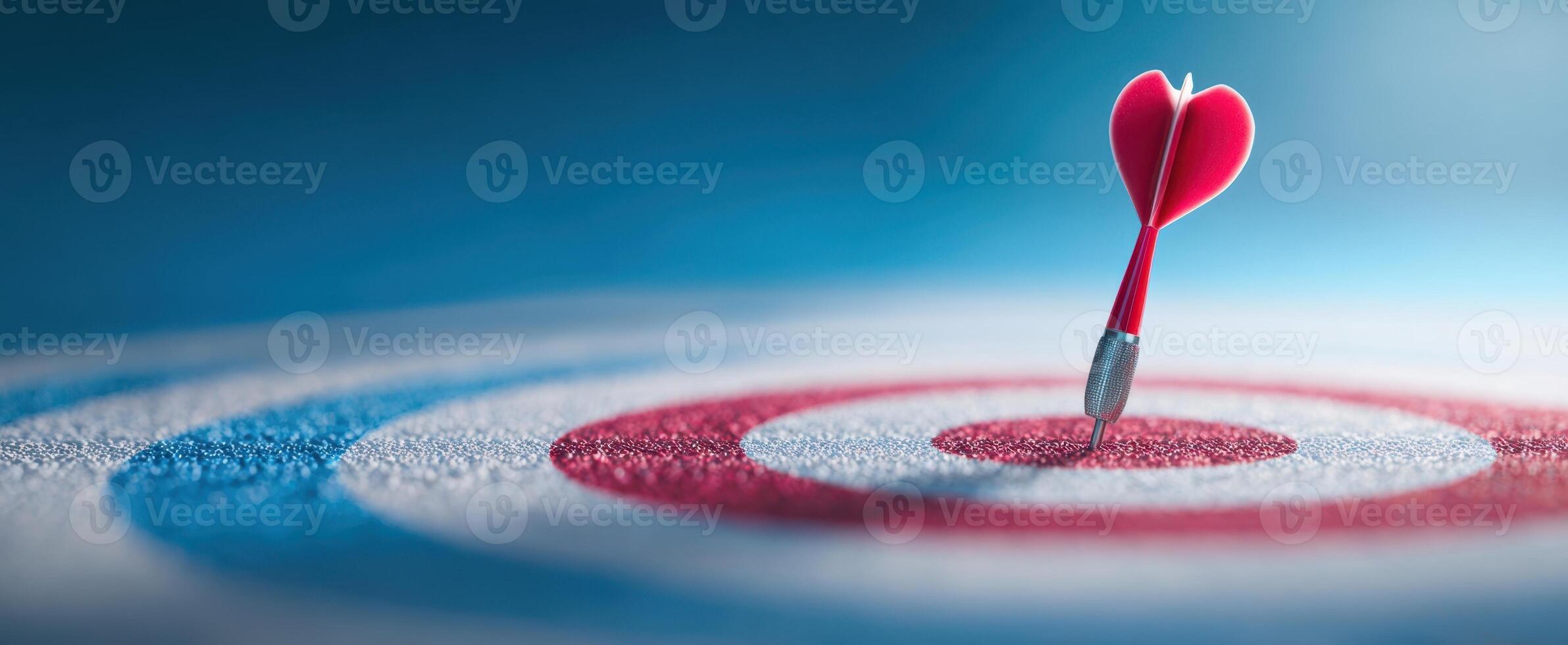 The heart-shaped dart hitting the target in a creative love concept. photo