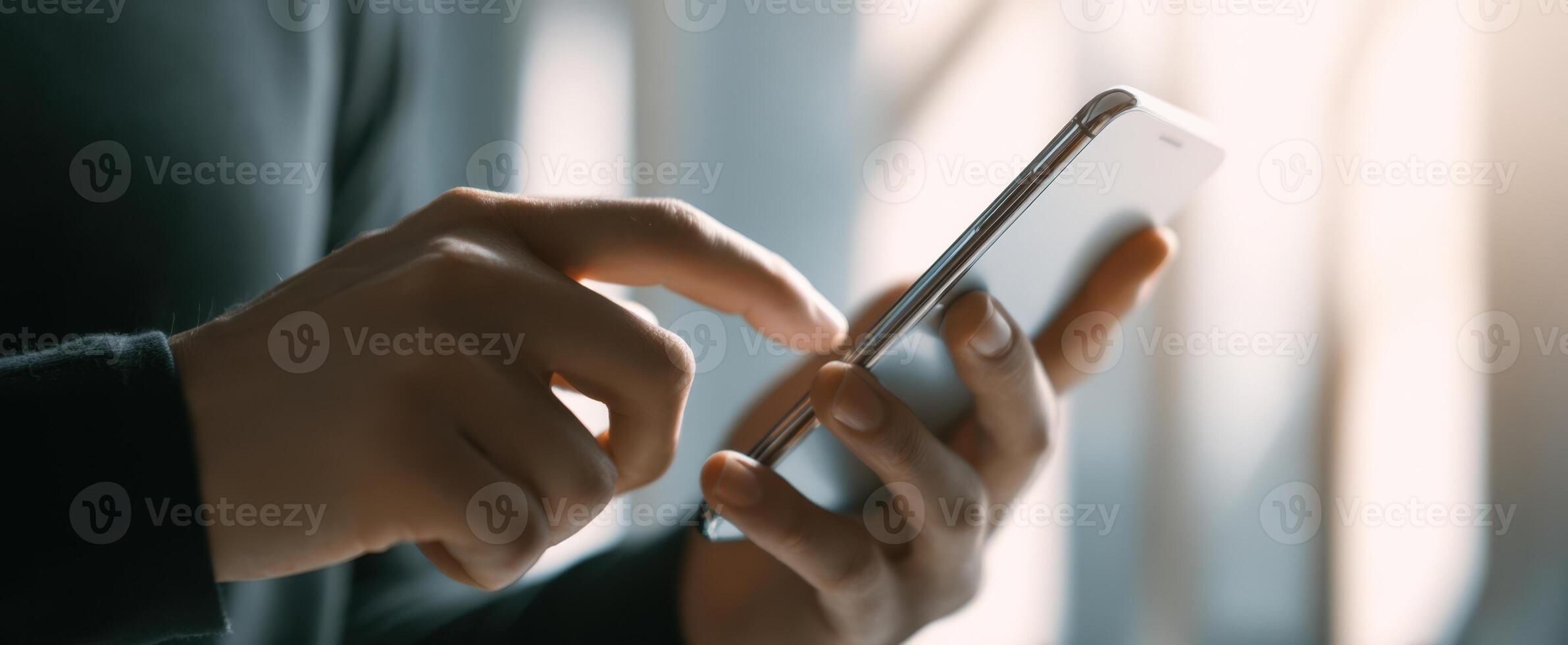 The smartphone interaction in a modern lifestyle setting with natural light. photo