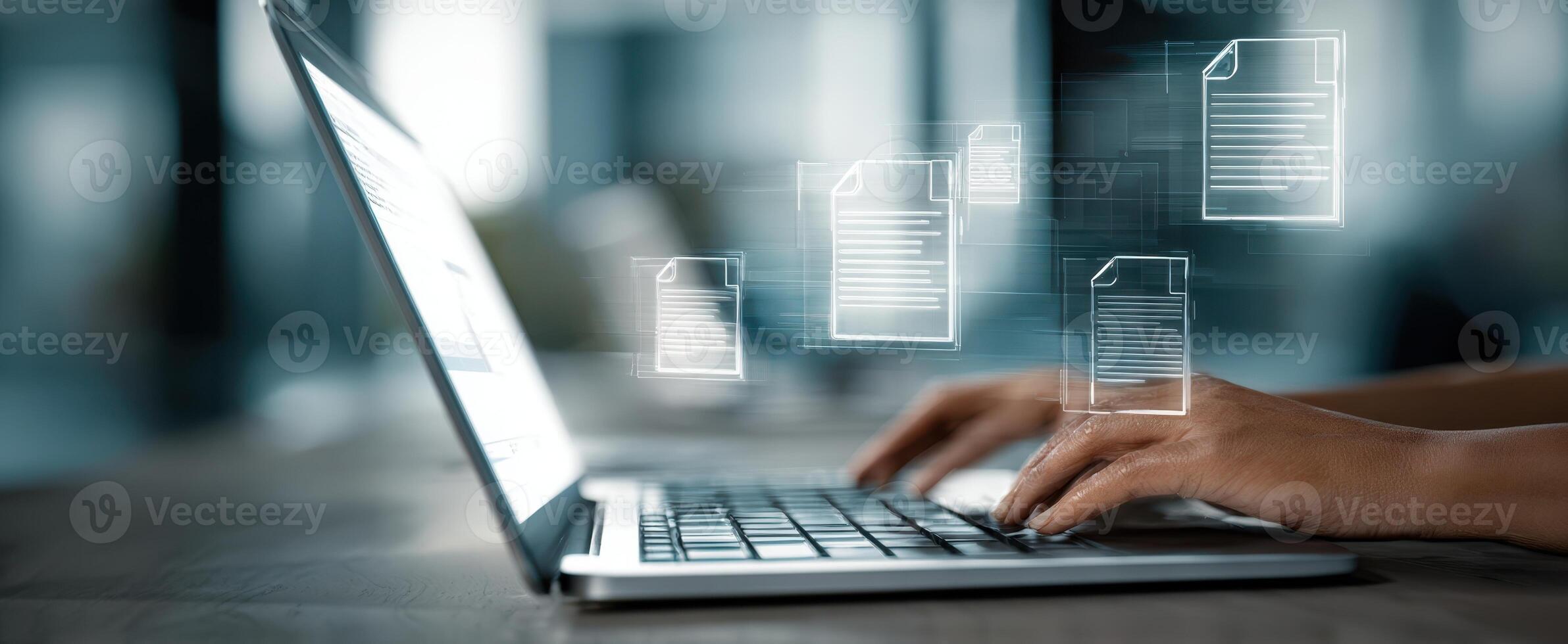 The laptop displaying digital documents during productive workspace activity. photo