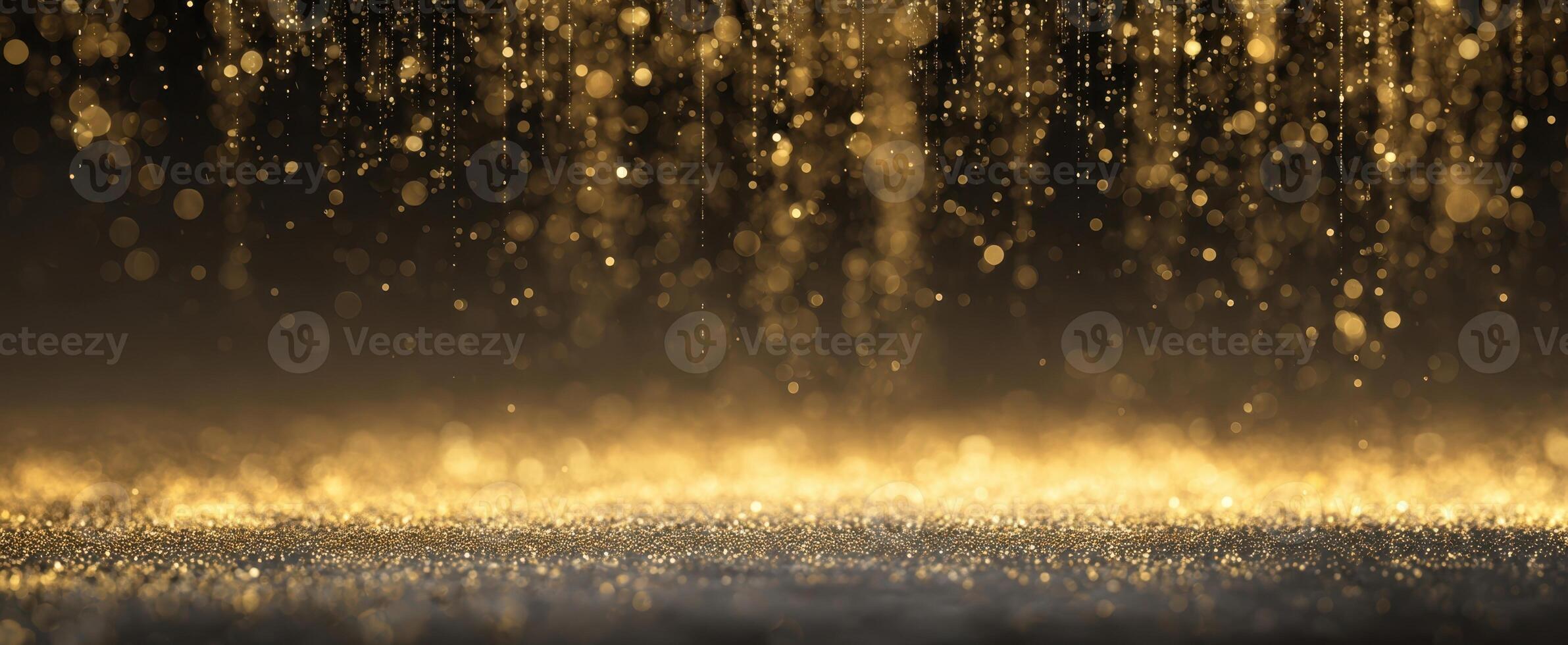 The golden glittering particles creating a magical and festive atmosphere photo