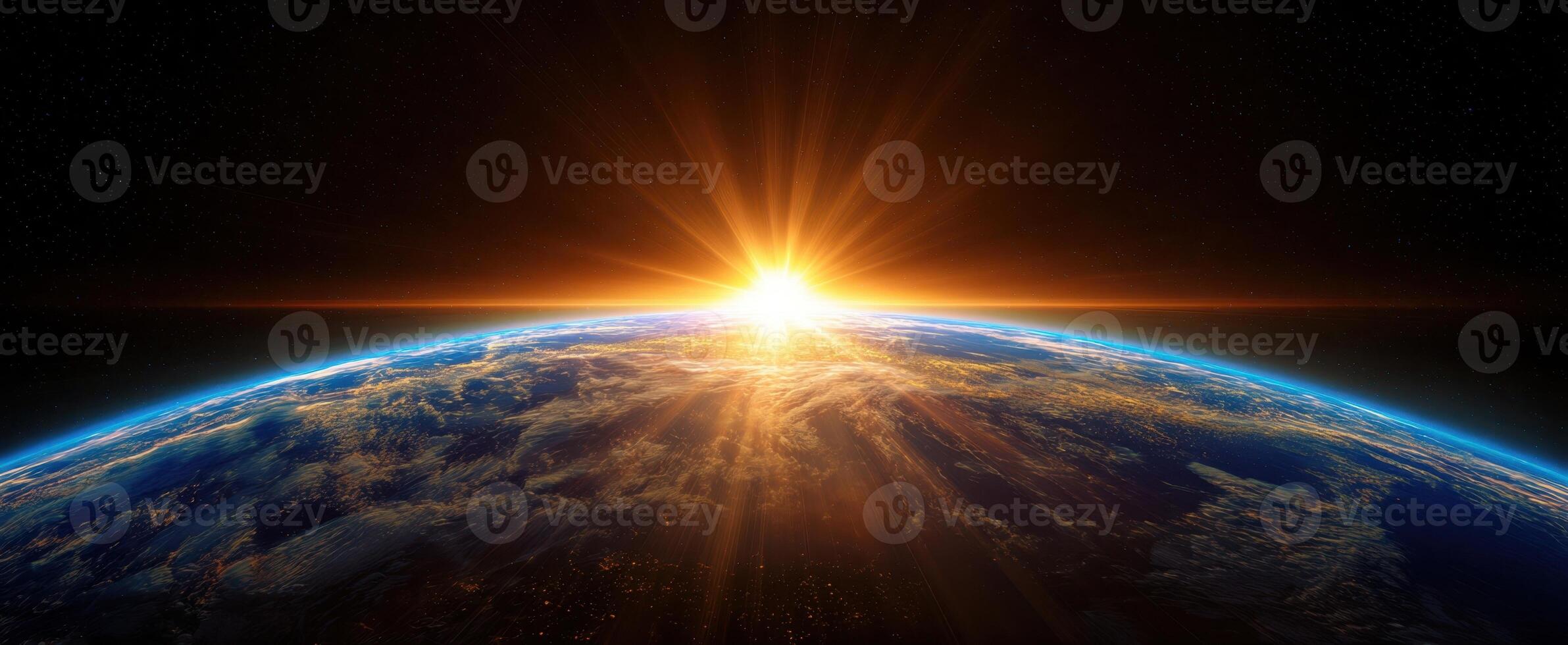 The breathtaking sunrise illuminating Earth from the perspective of space. photo
