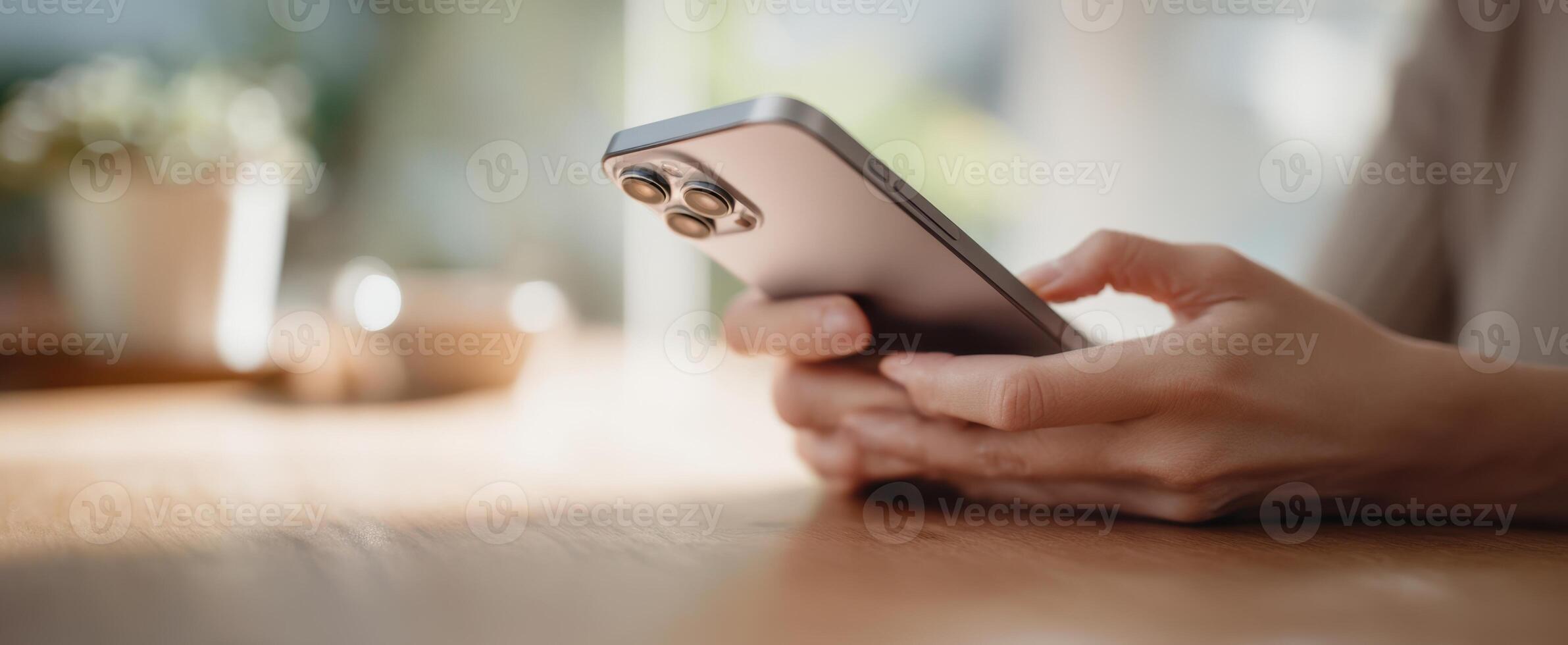 The hands using a smartphone for communication and connection in a modern setting. photo