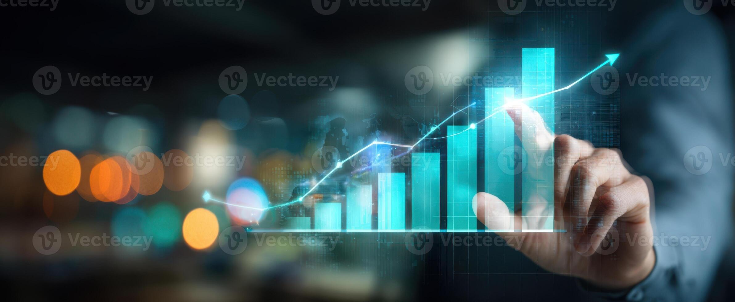 The hand interacting with a digital growth chart showcasing business progress and success. photo
