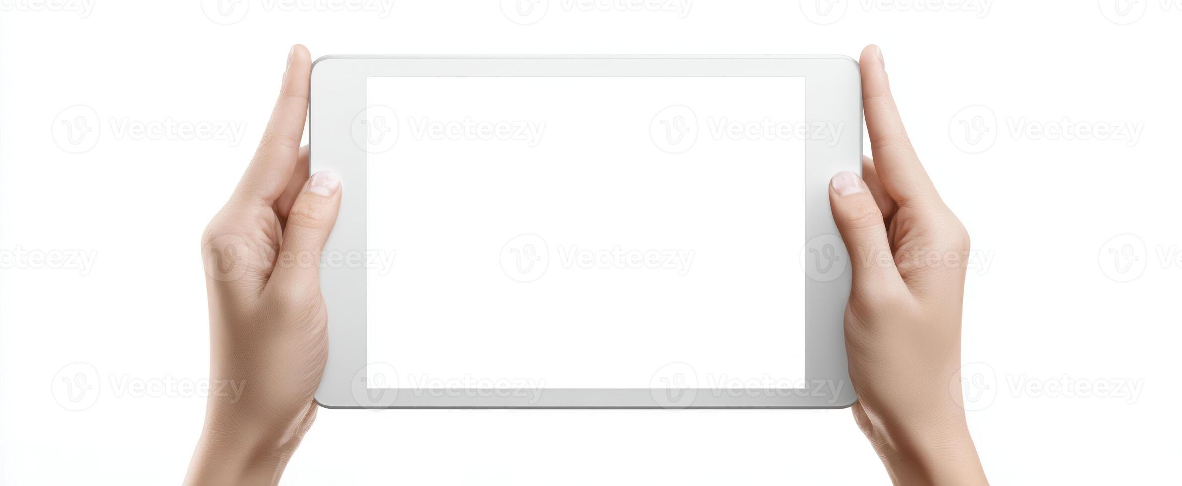 The tablet being held with a blank screen for creative design use. photo