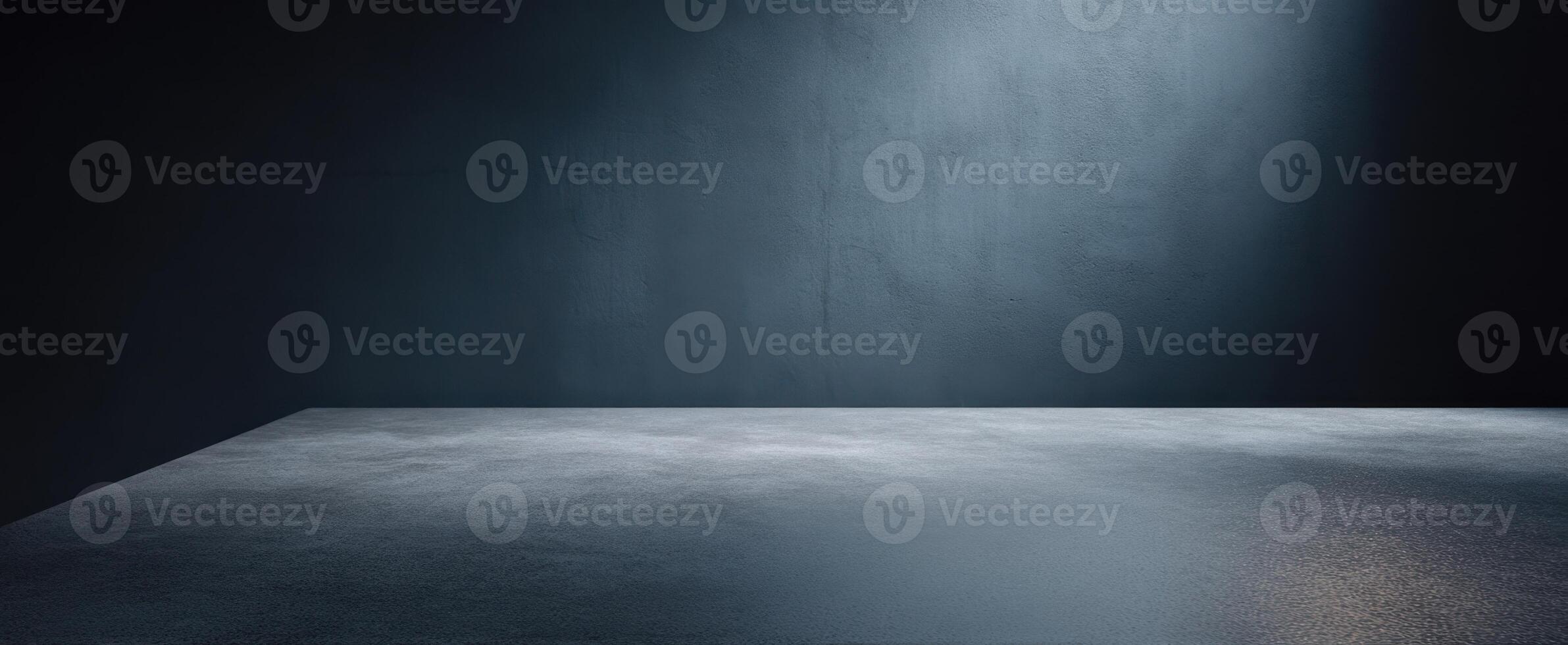 The dramatic empty space with a spotlight on a reflective surface. photo