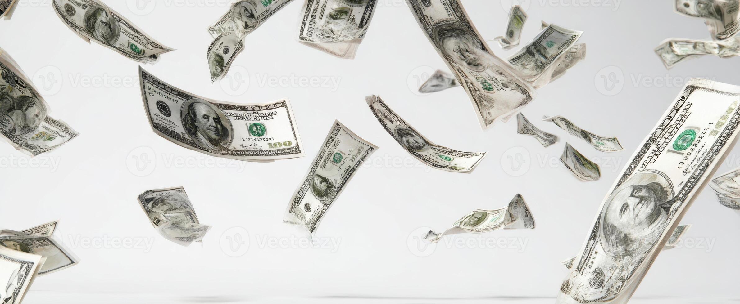The abundance of flying dollar bills against a minimalist background. photo