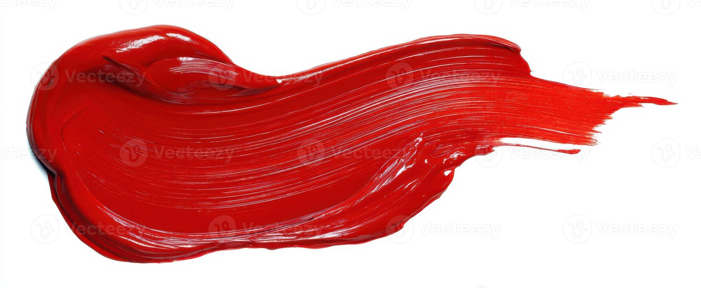 The vibrant red paint stroke evoking creativity and artistic expression. photo