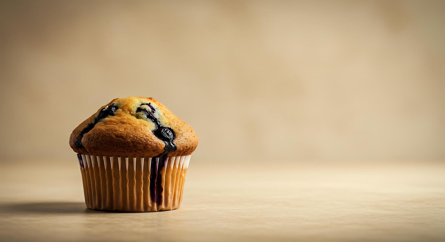 A muffin with blueberries on top photo