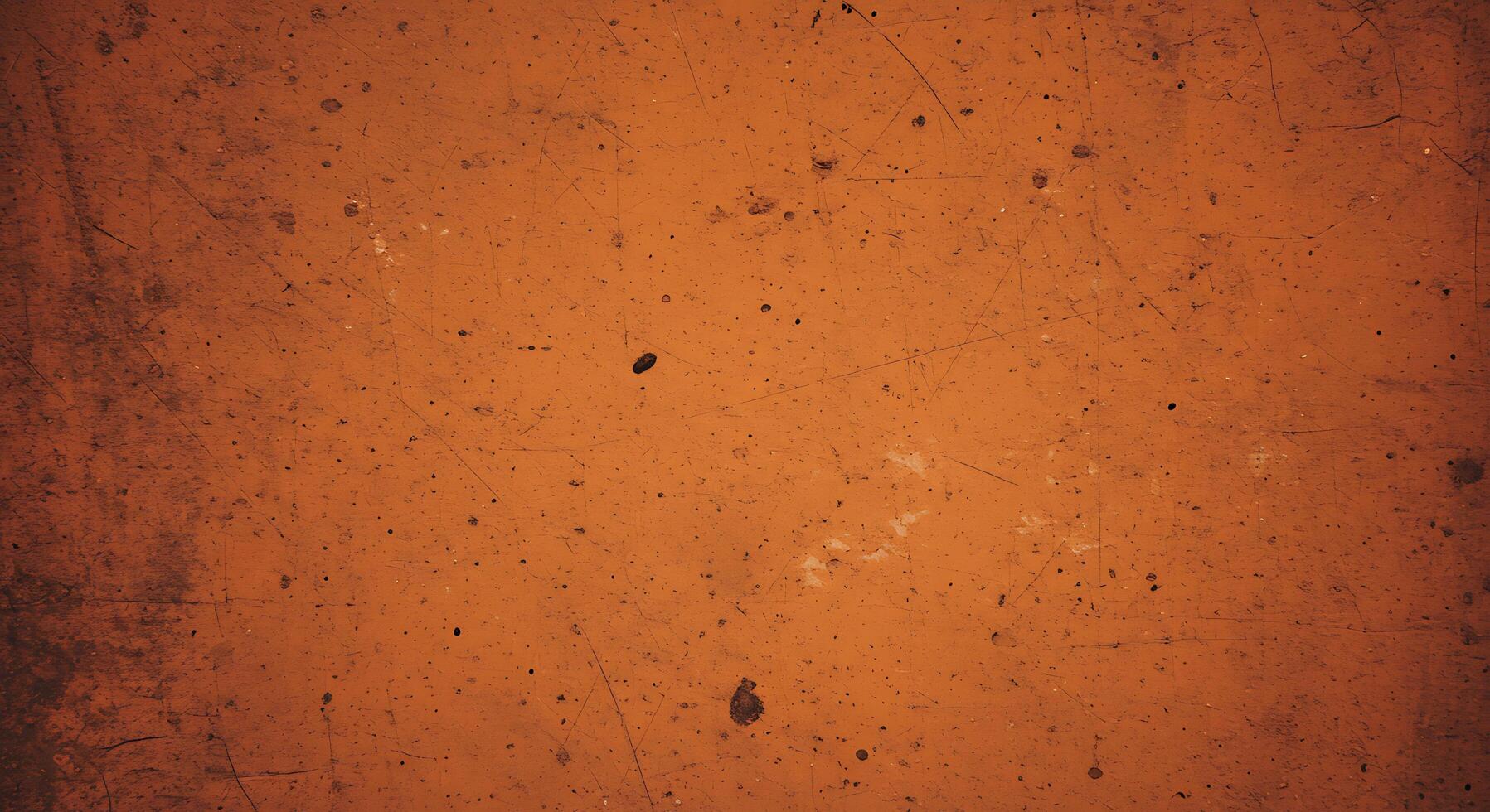 An orange background with some scratches and dirt photo
