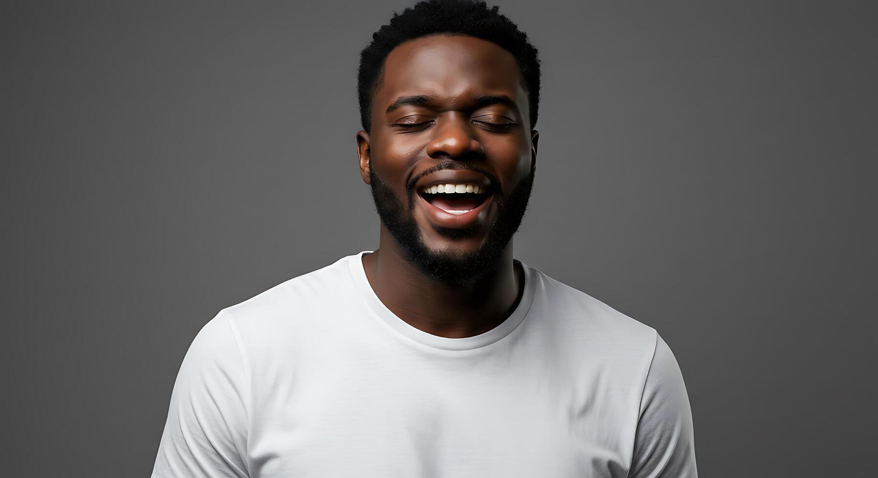 A man with his mouth open and a white t - shirt photo