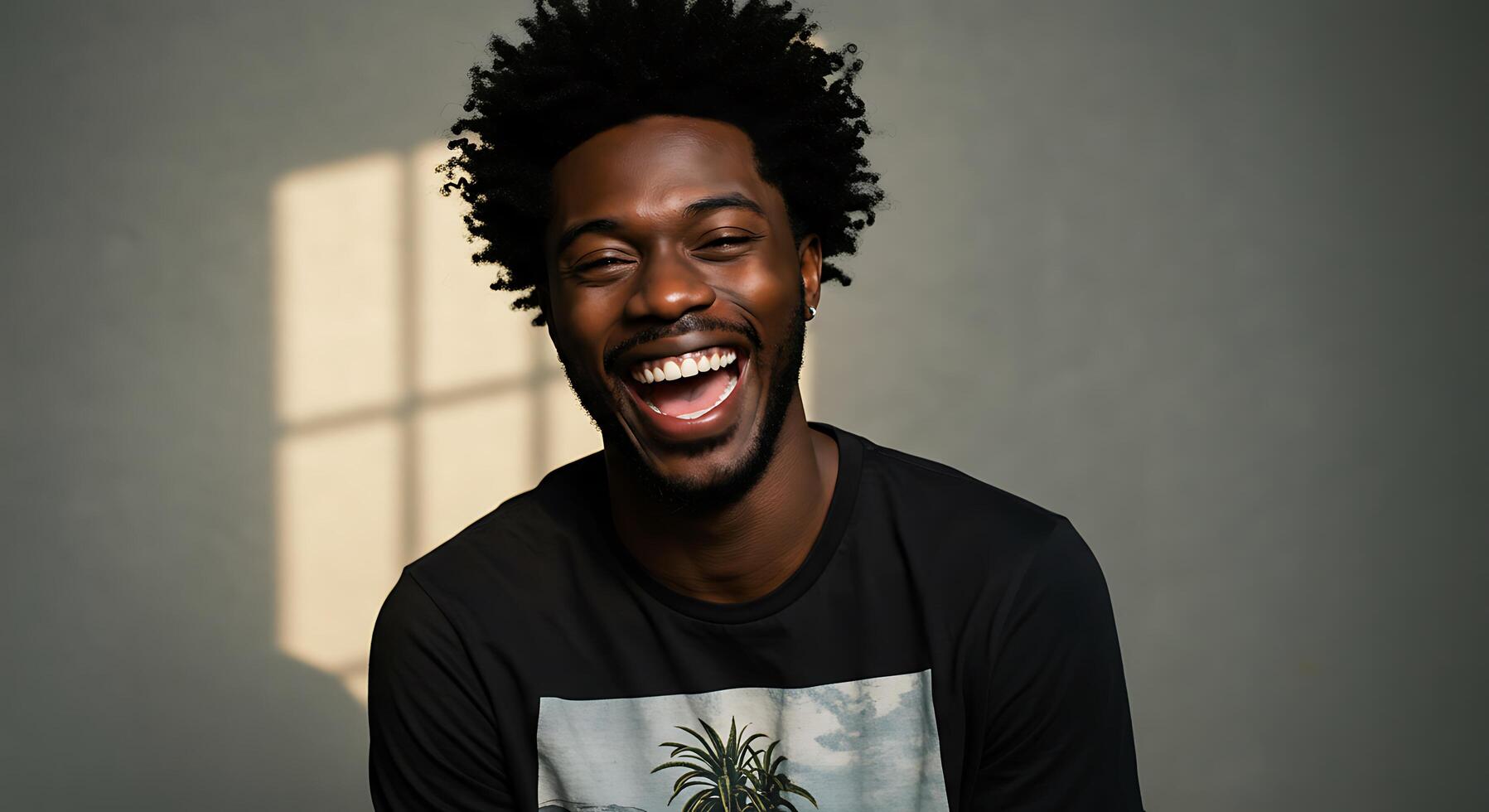 A man with a black shirt and a smile photo