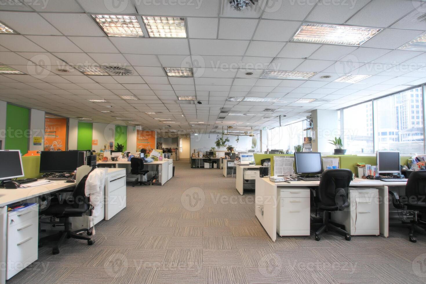 An Open Office With Office Chairs And Computers In A Modern Interior photo