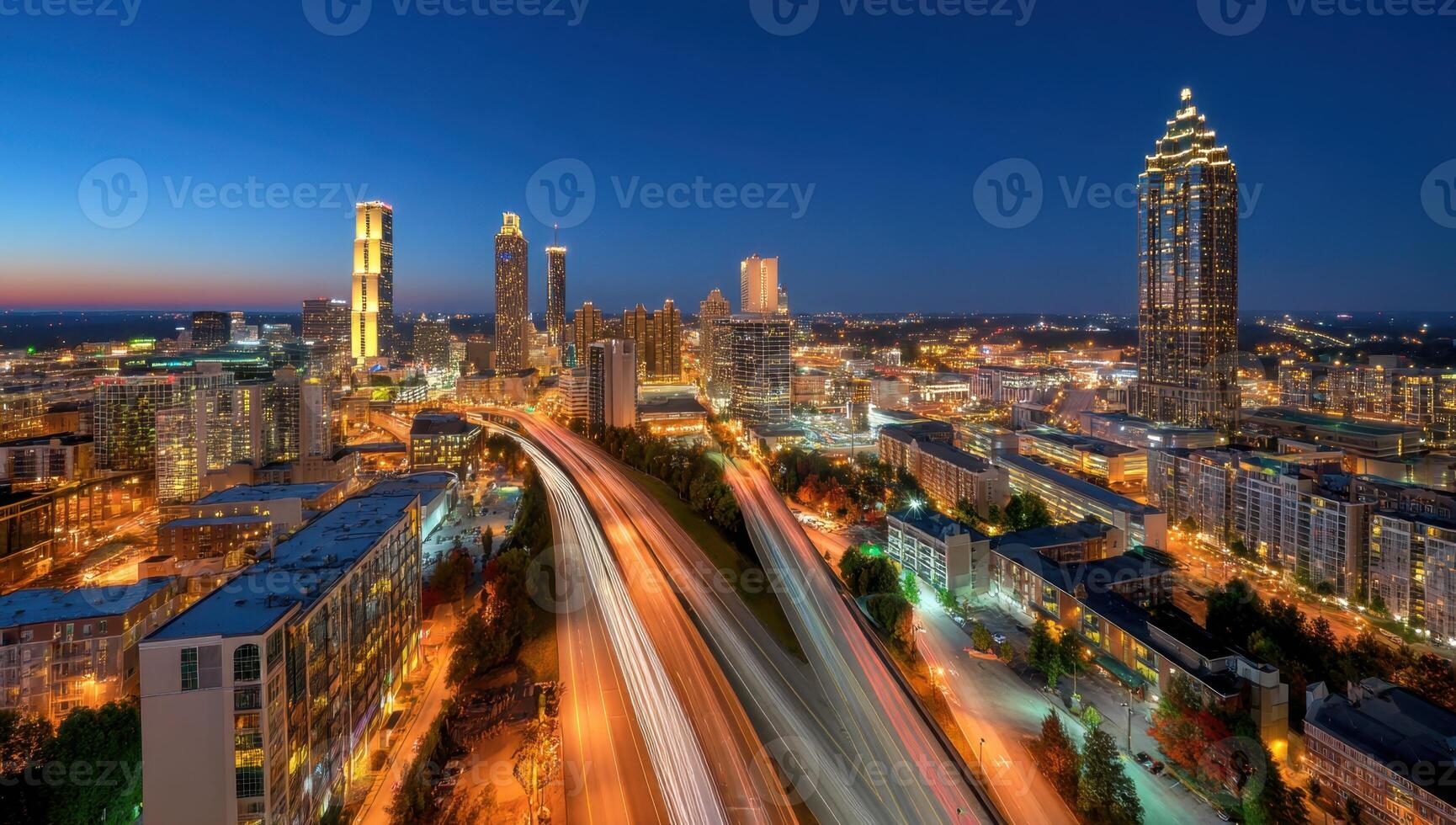 The Georgia Metropolis Cityscape Illuminated at Night Sky with High Towers photo