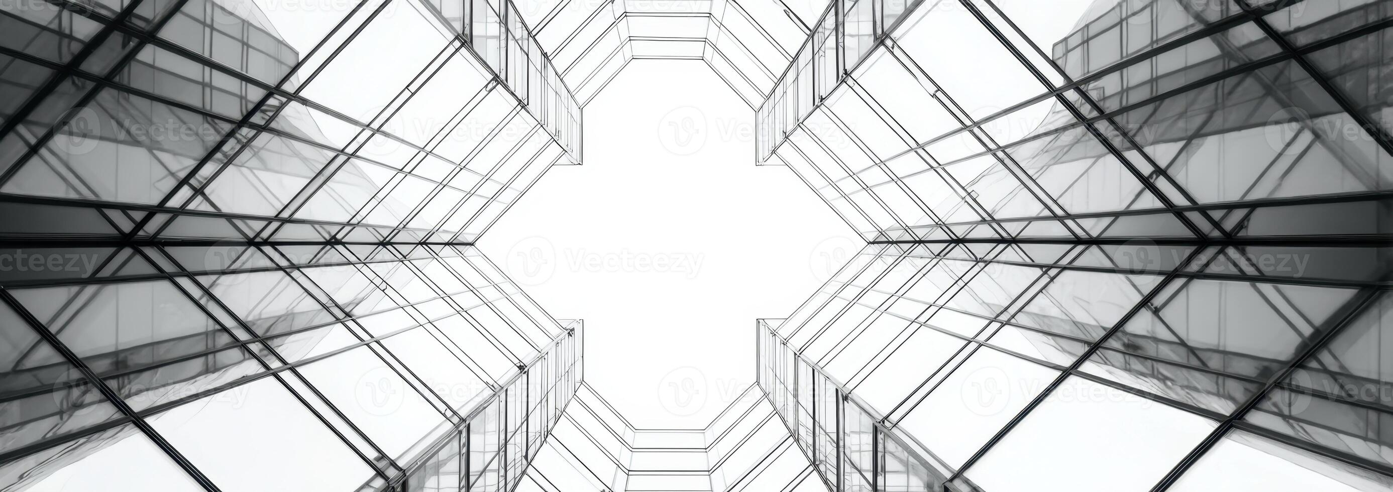 A black and white photo of a building with a sky view