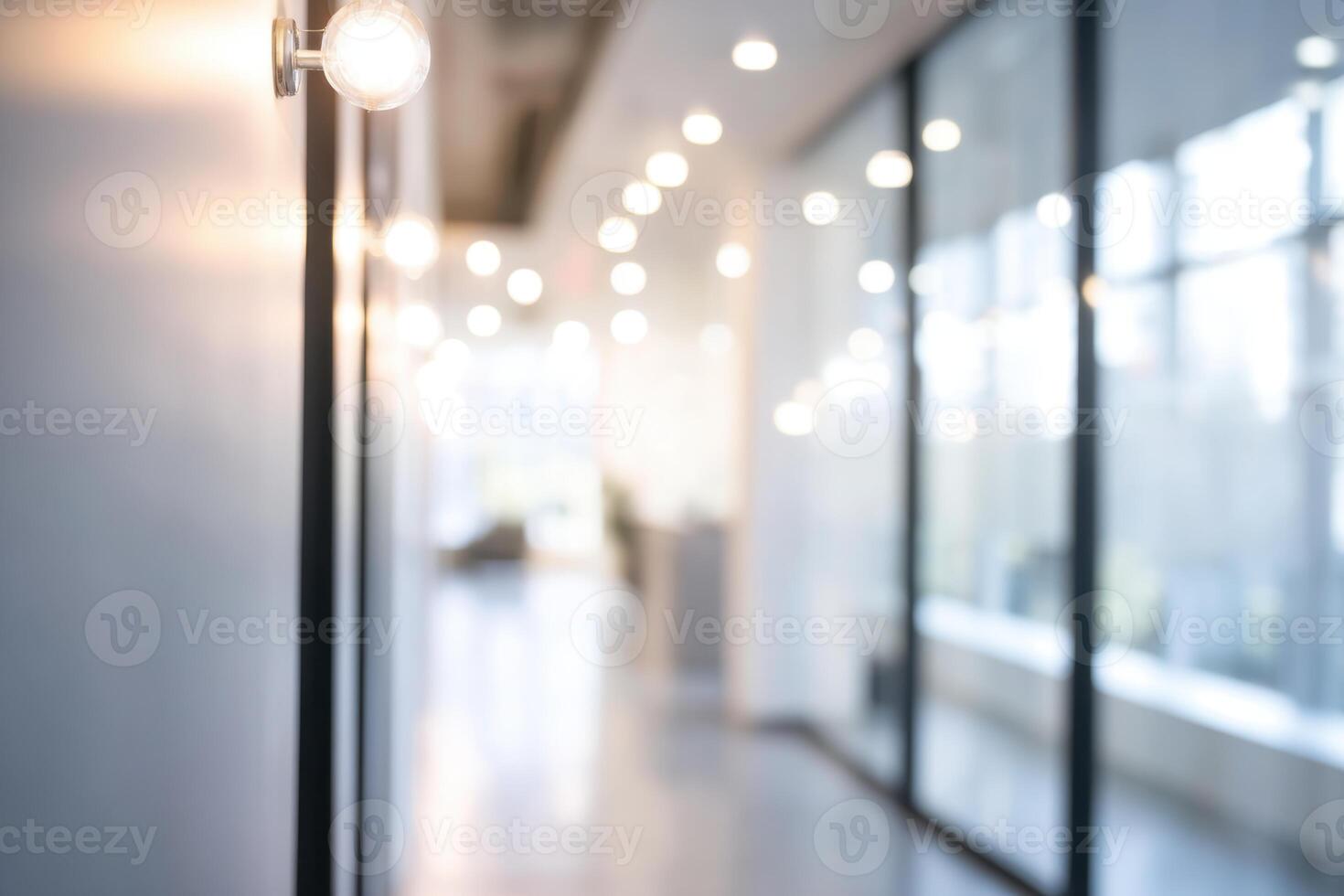 Illuminated Office Hallway with Glass Partitions and Bright Ambience photo