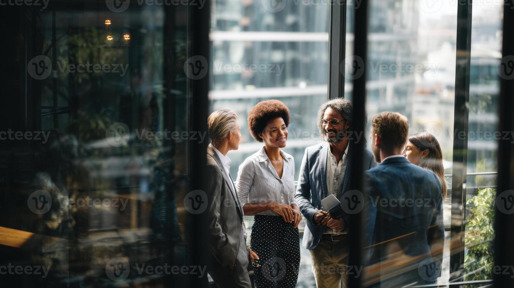 Diverse Group of Professionals Collaborating and Discussing Strategies in Modern Office photo