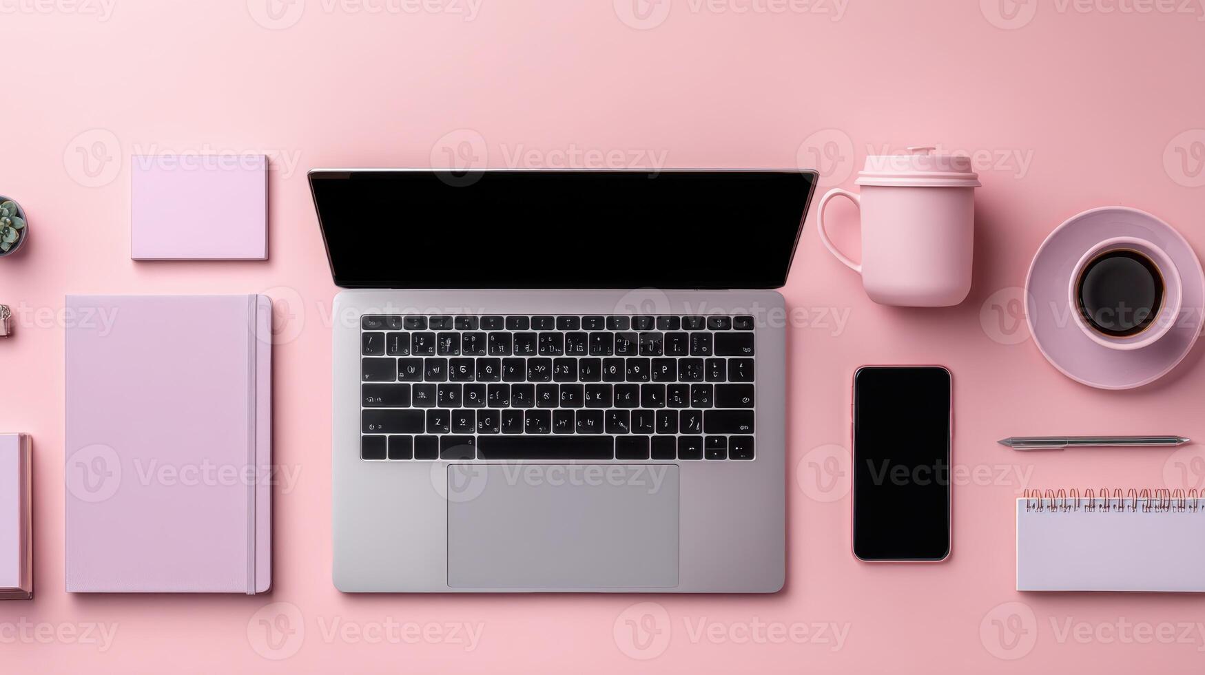 Minimalist Workspace Pink Desktop Flat Lay View of Laptop and Accessories photo