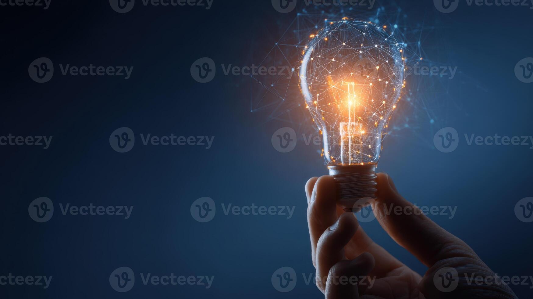 Illuminating Innovation A Hand Holds a Lightbulb Bursting with Creative Energy photo