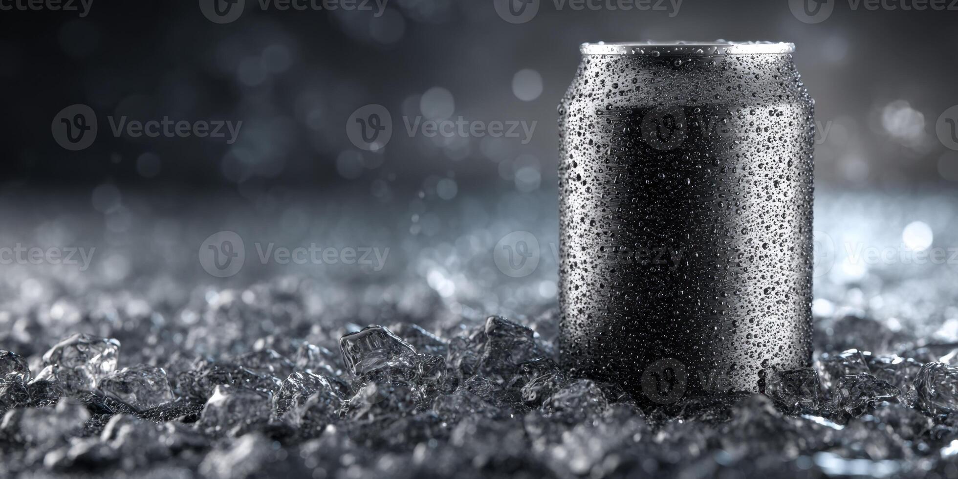 A refreshing black soda can displayed on bed of ice crystals photo