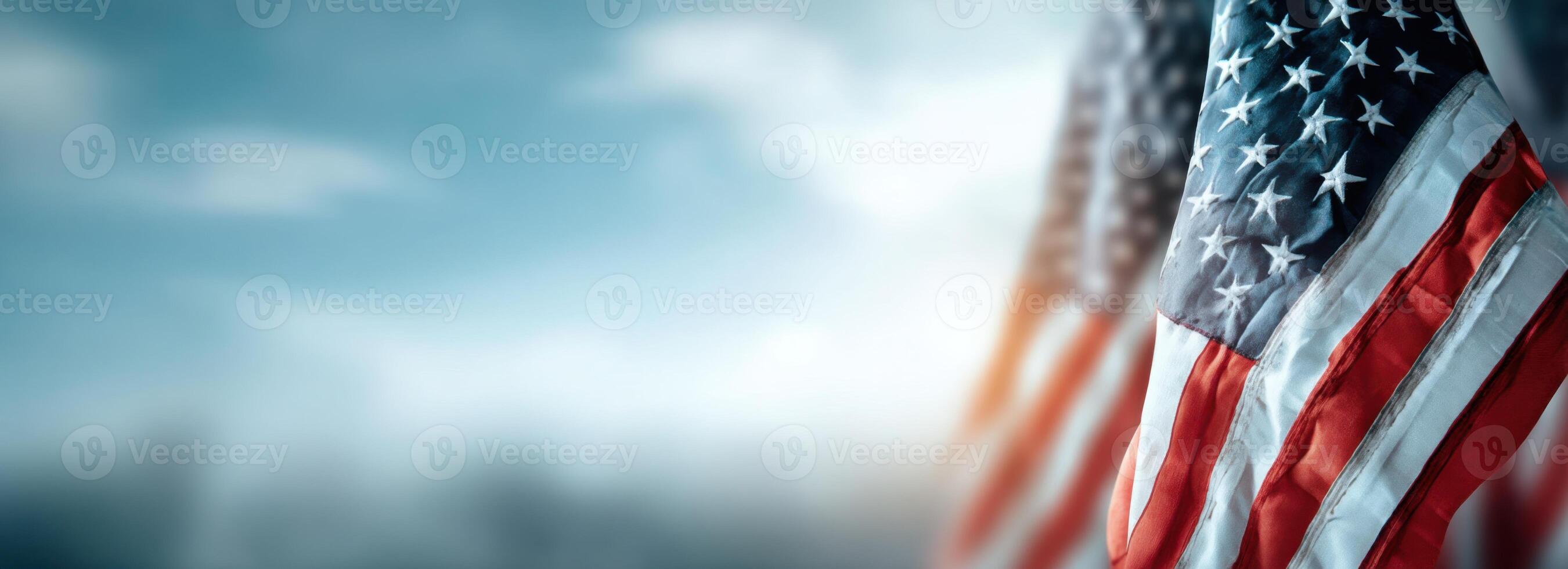 American Flags Blowing in the Wind on Blue Background in the Sky photo