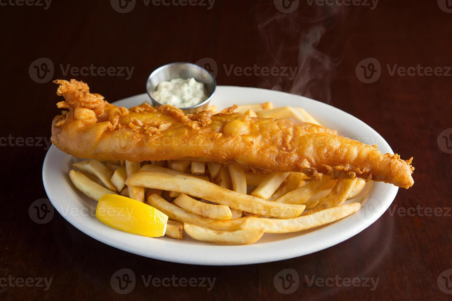 A plate of fish and chips photo