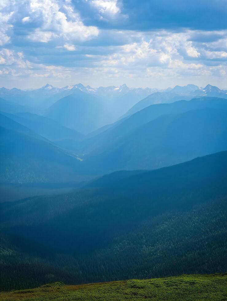 Nature Background Majestic Blue Mountains Landscape Panoramic View of Distant Peaks and Verdant Valley photo