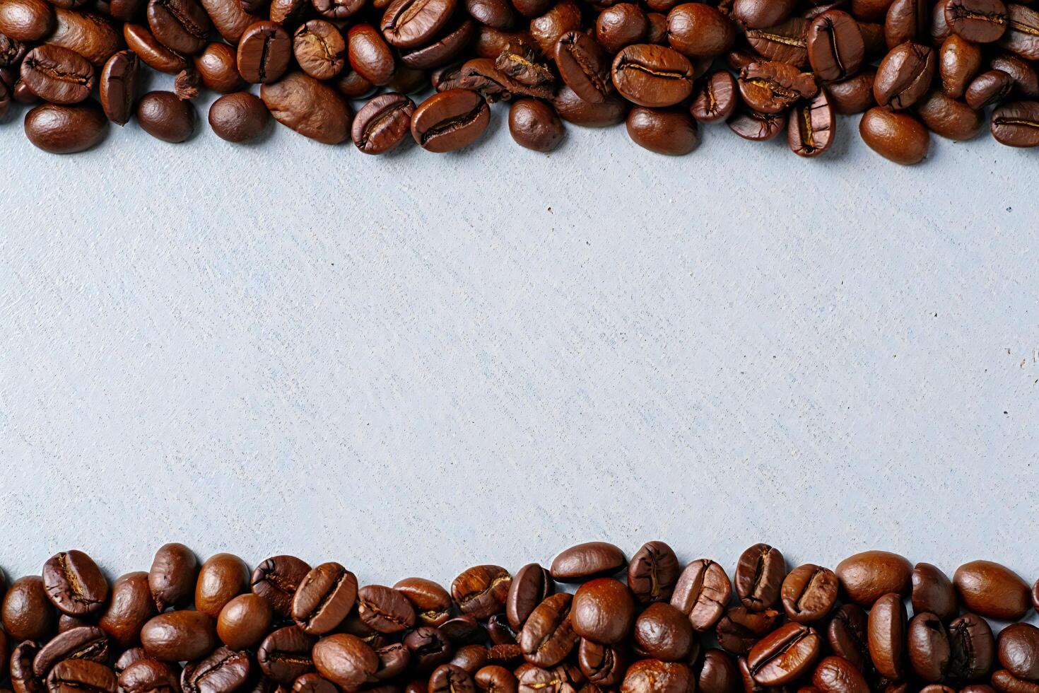 Coffee Background Aromatic Coffee Beans Border Frame Roasted Coffee Beans on Light Grey Background Copy Space photo