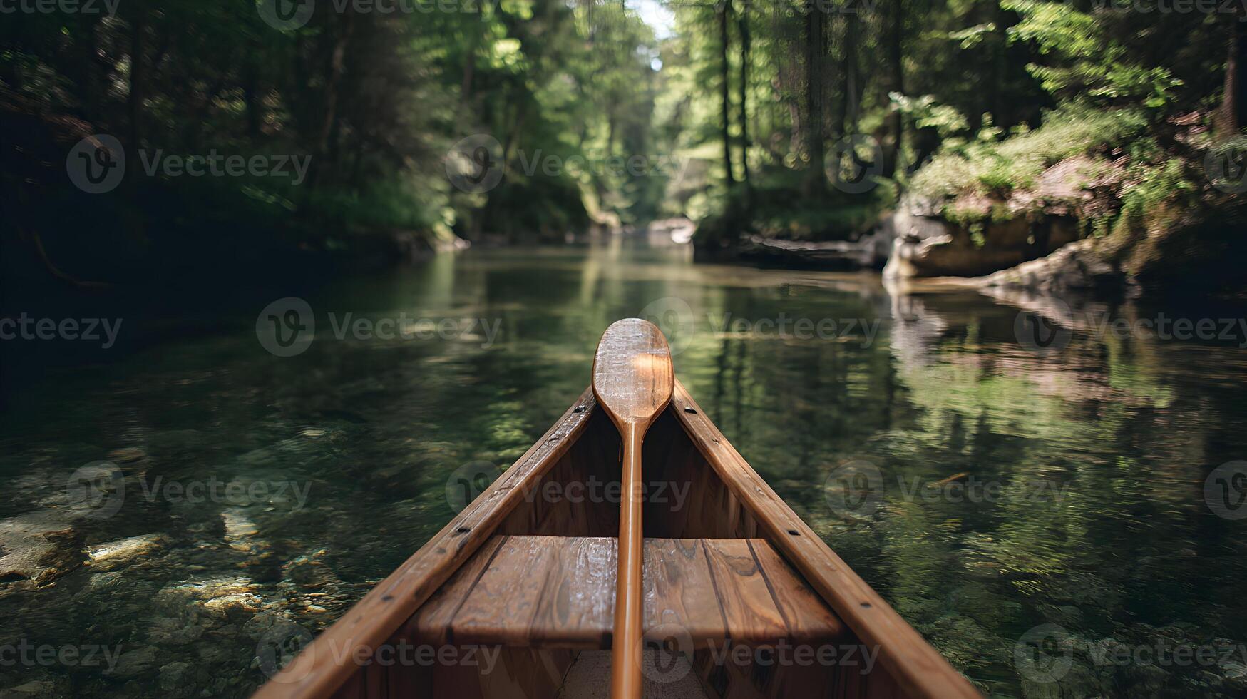 A serene canoe journey through the lush forest river offers peace and connection with nature photo
