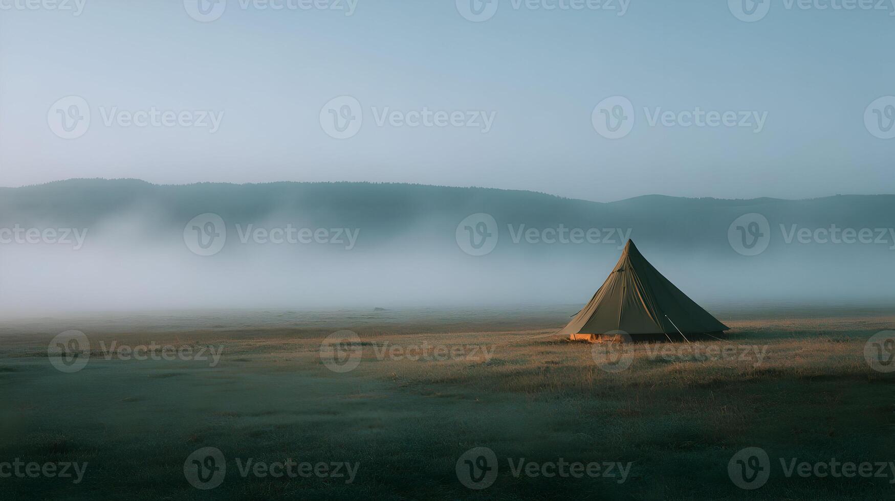 A serene campsite under a vast sky beckons with promises of adventure and connection with nature photo