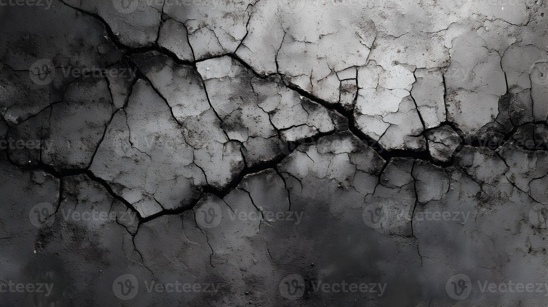 Cracked and weathered gray wall surface showing signs of wear and tear a dramatic background photo