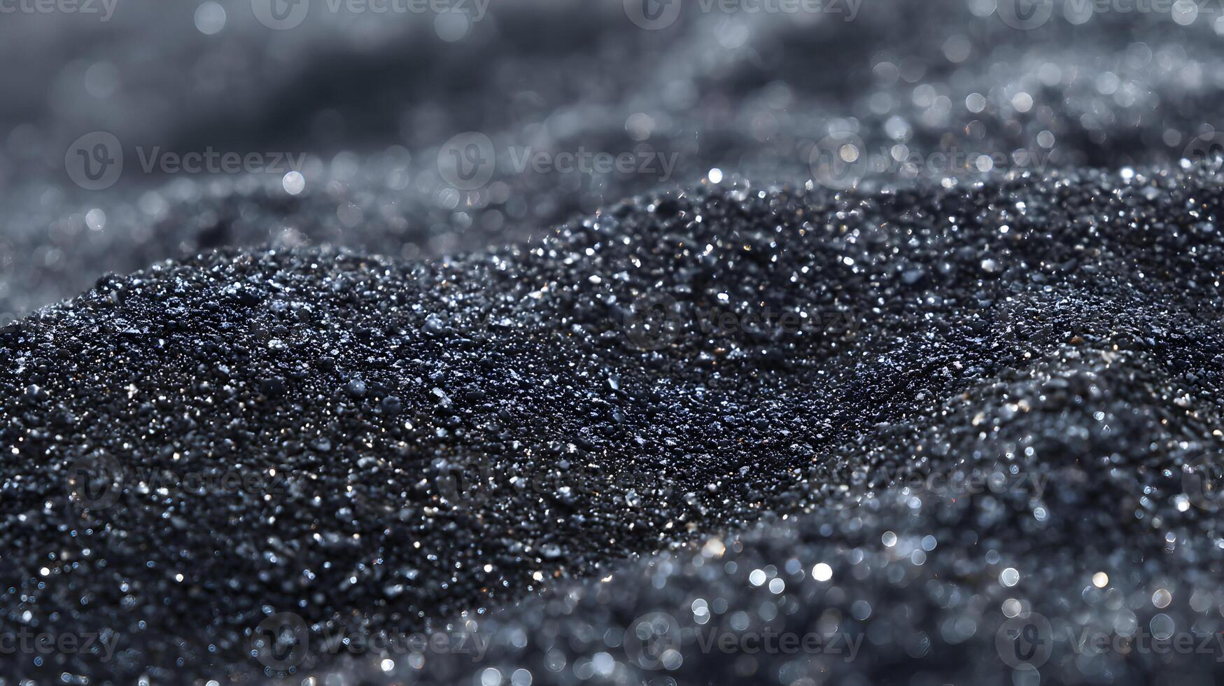 An abstract background image showcasing undulating heaps of dark shimmering material under soft illumination photo