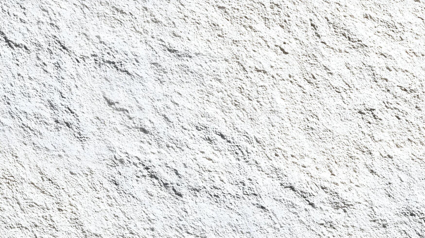 Rough textured white surface with subtle shadows creating a natural stone like visual effect ideal for backgrounds photo