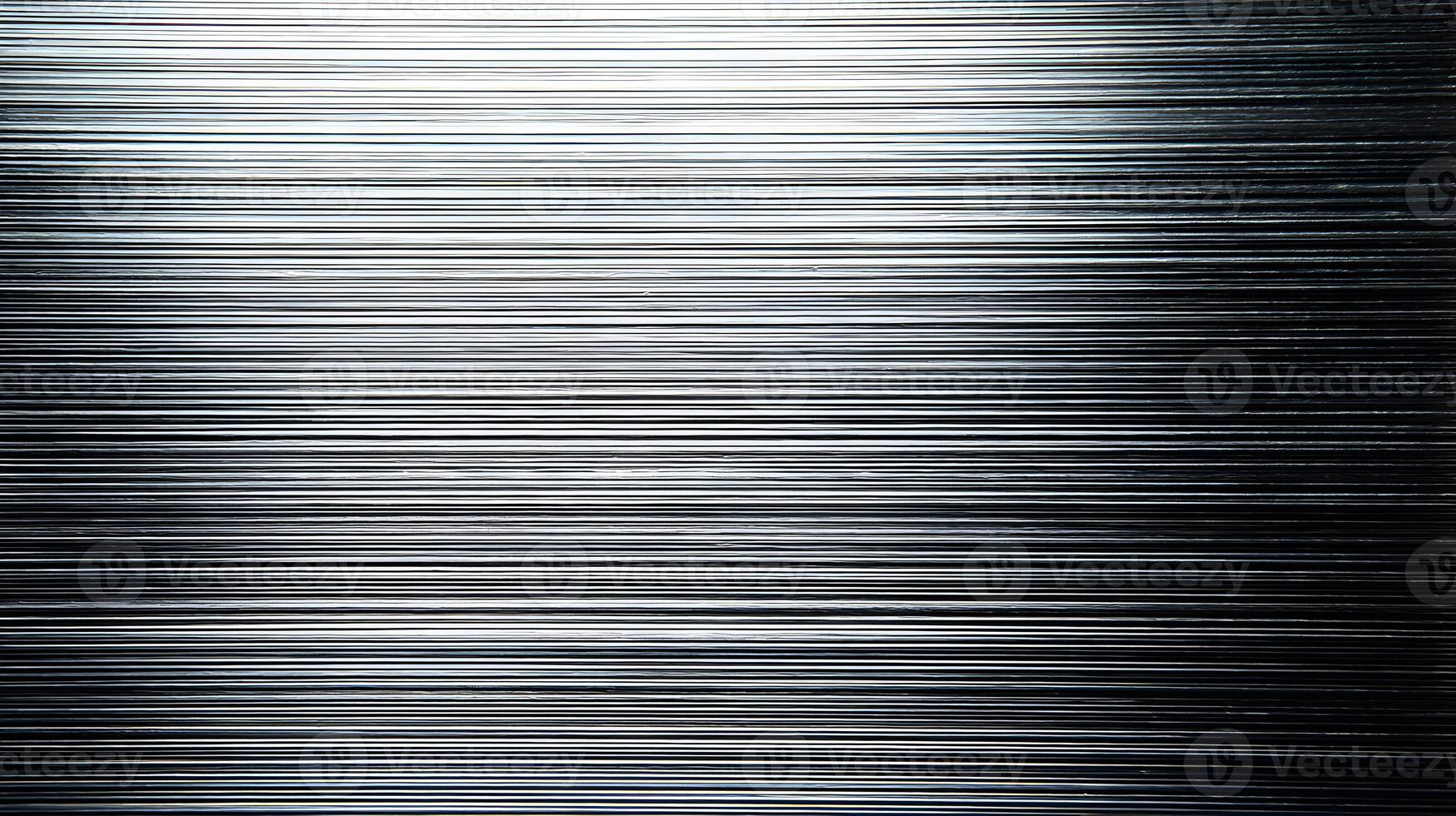 Striking minimalist silver background showcasing parallel horizontal lines creating a textured metallic effect photo