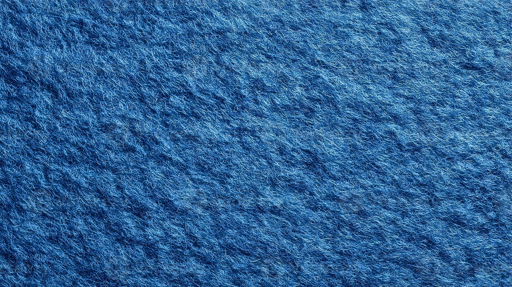 A detailed view of a vibrant blue fabric featuring a soft and slightly rough texture creating a captivating surface photo