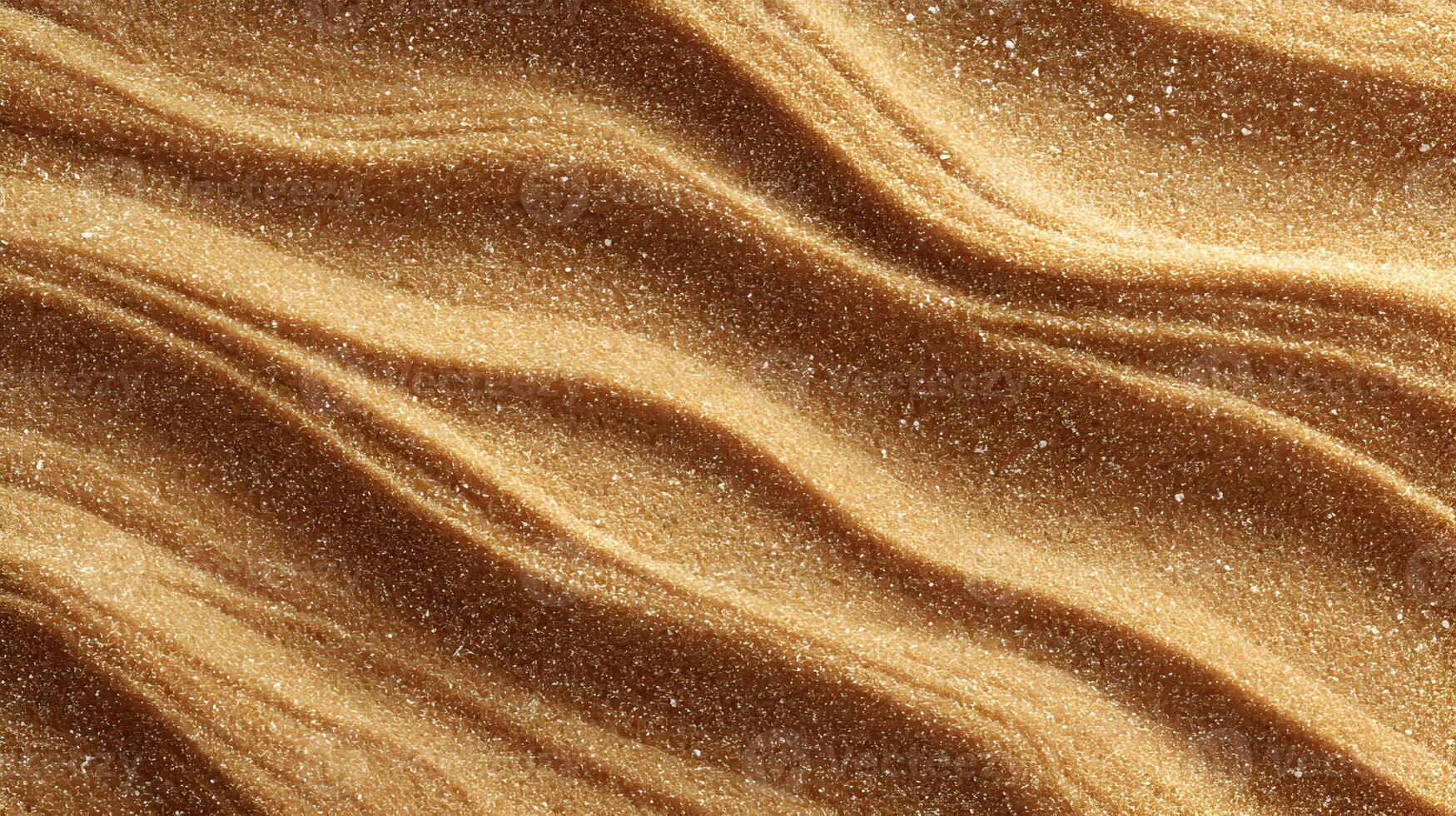 Golden sand dunes create a mesmerizing wavy pattern under the sunlight creating a unique texture photo