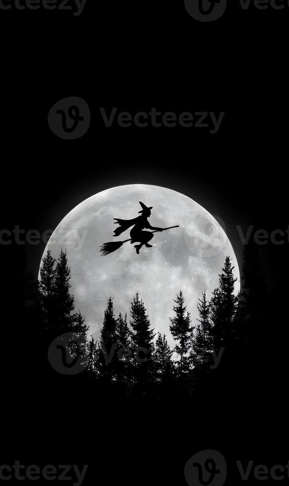 Ethereal halloween night a witch soars across a mystical full moon above the dark forest trees photo