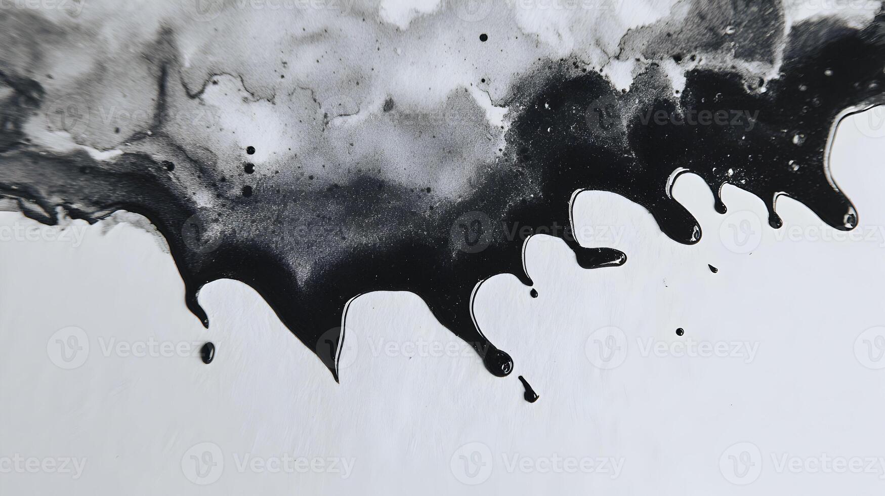 Dramatic Black Ink Splatter Creating an Abstract Monochrome Design on a Clean White Background photo