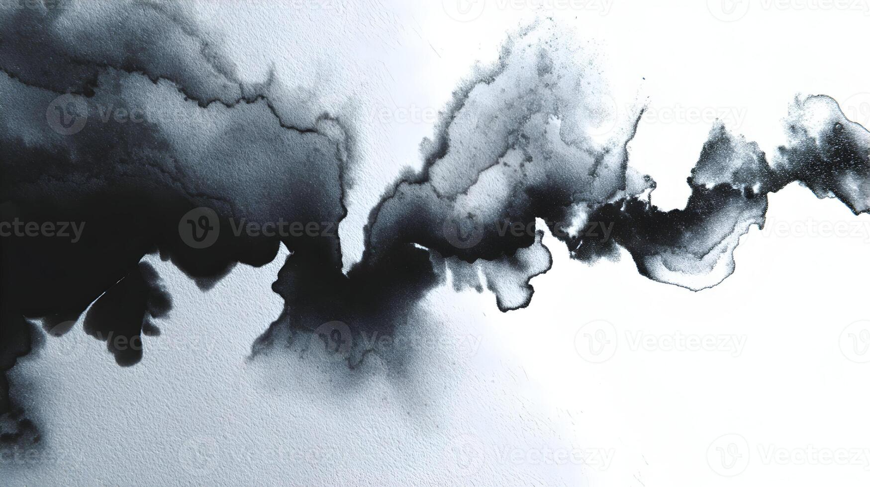 Abstract ink wash painting in shades of gray and black creating a dynamic fluid composition photo