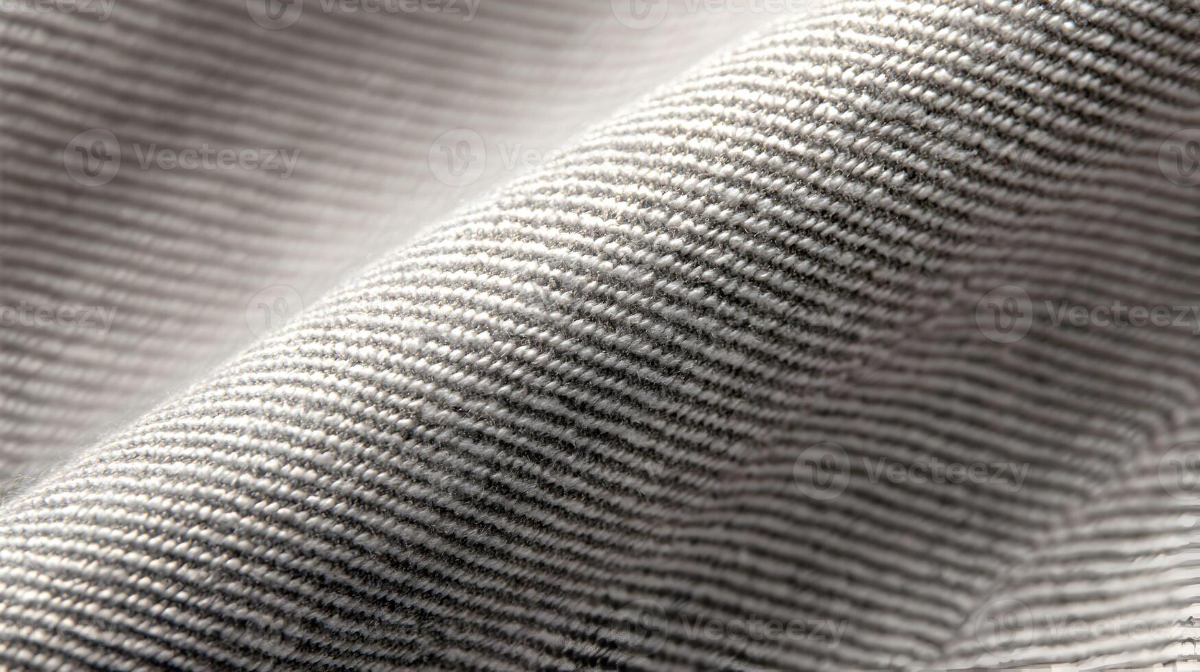 Close up of a fabric surface showing a detailed woven texture creating a visually appealing pattern photo